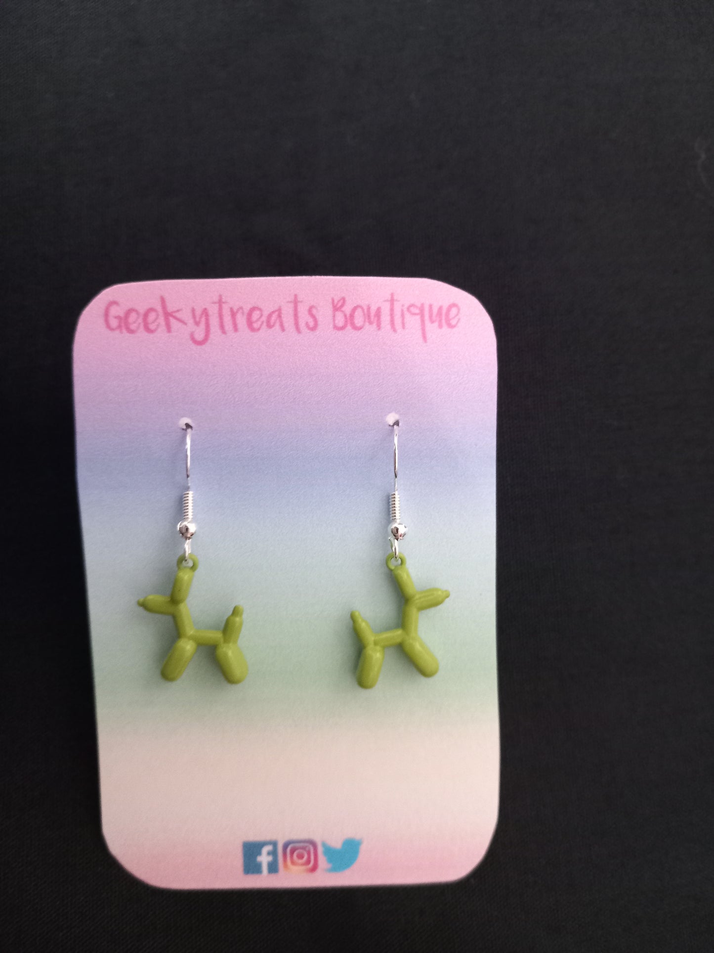 Green enamel balloon dog earrings