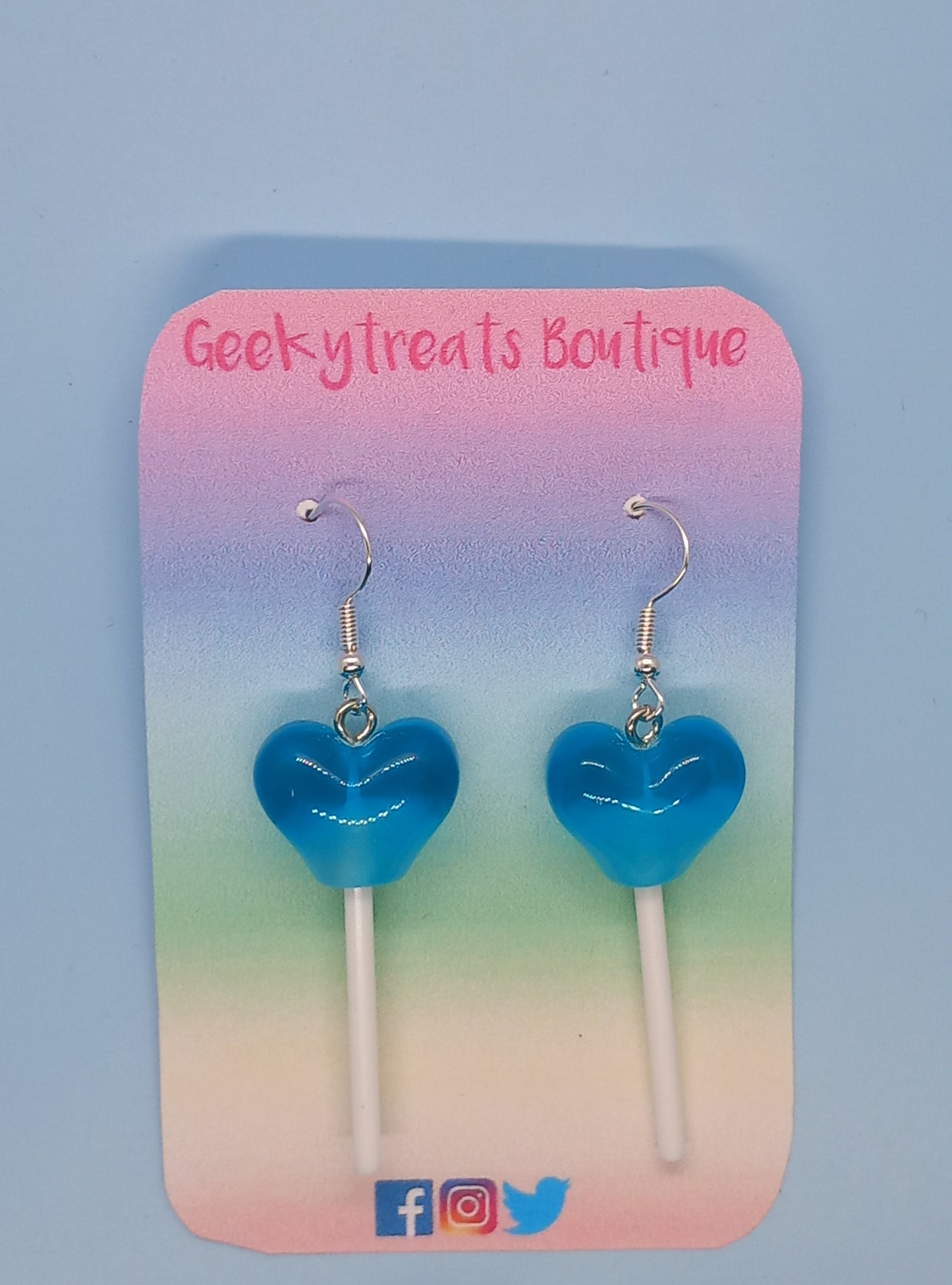 Blue acrylic love heart lollipop earrings