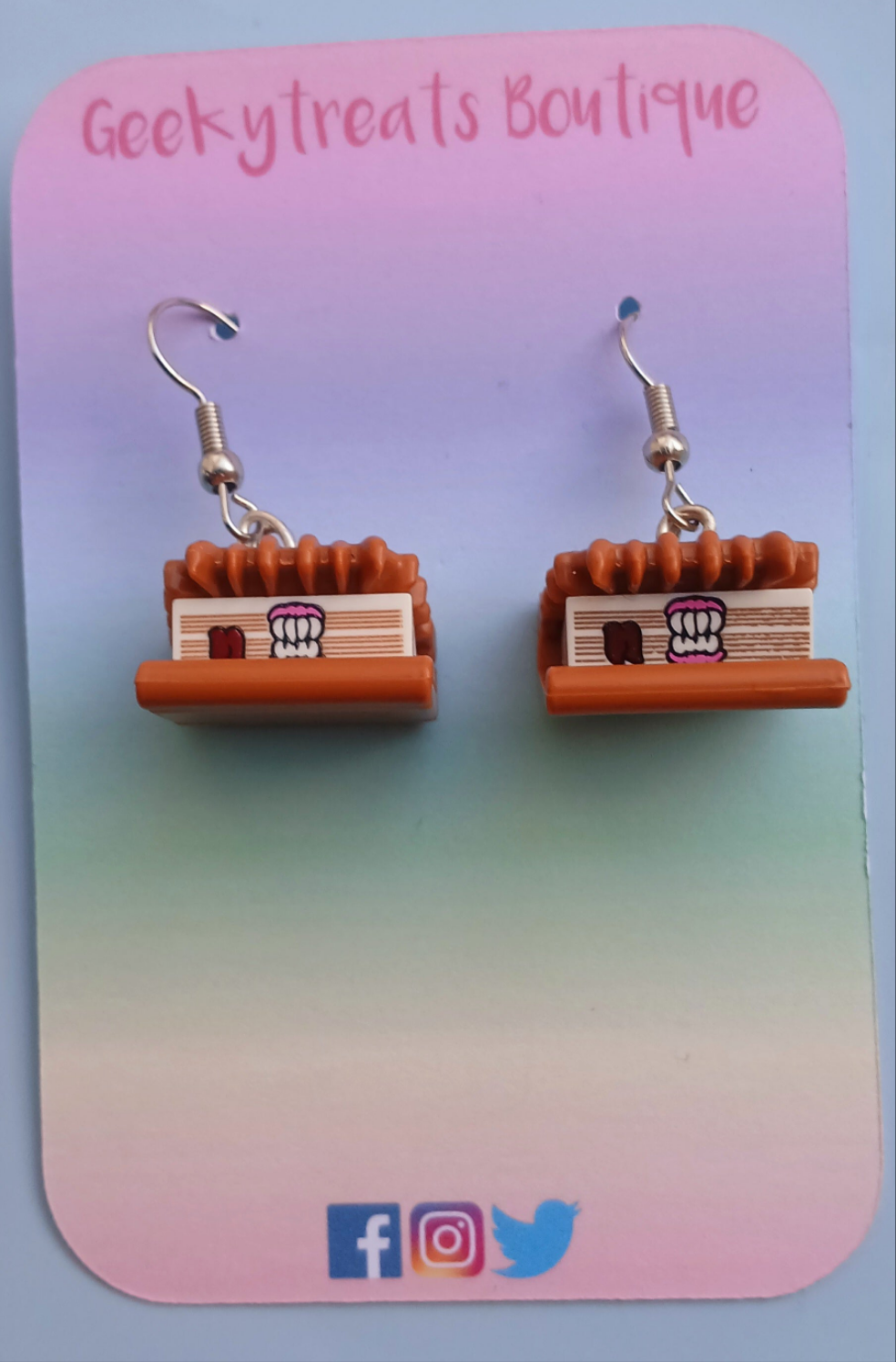 Book of monsters novelty earrings