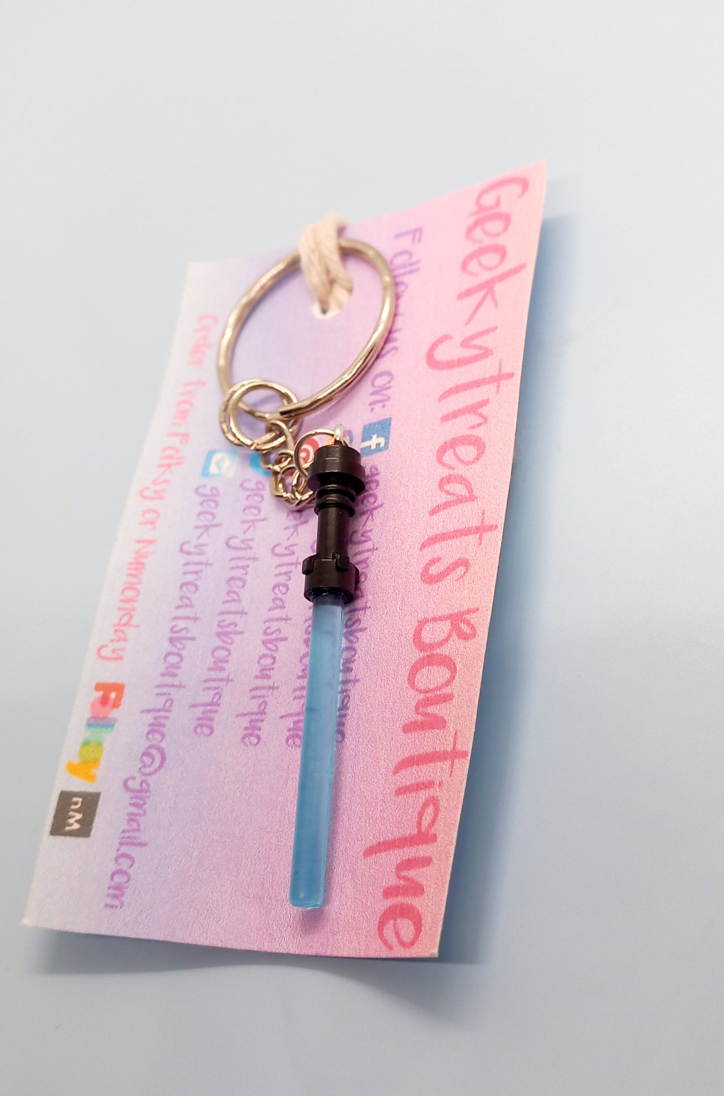 Blue lightsaber keyring