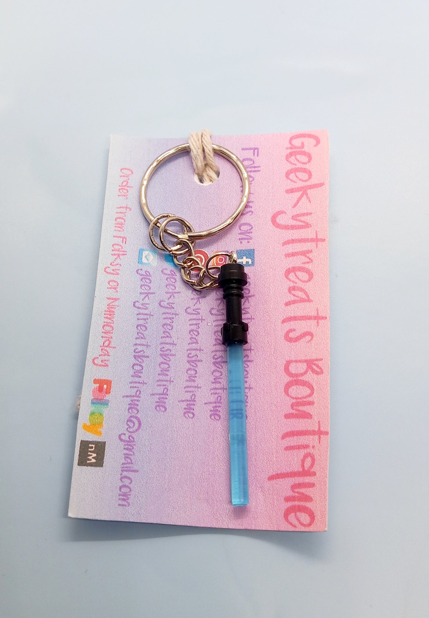 Blue lightsaber keyring