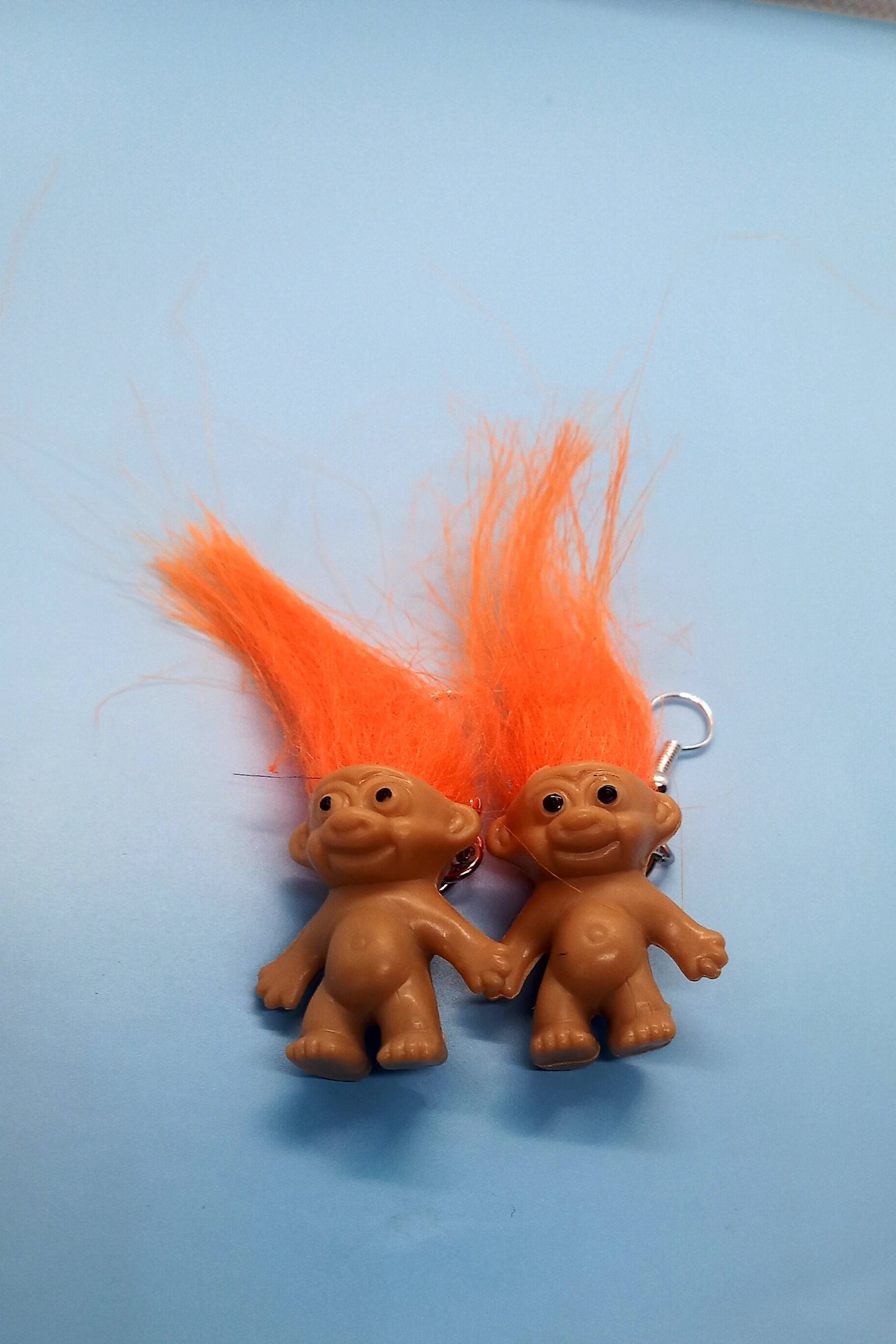 Orange haired troll earrings