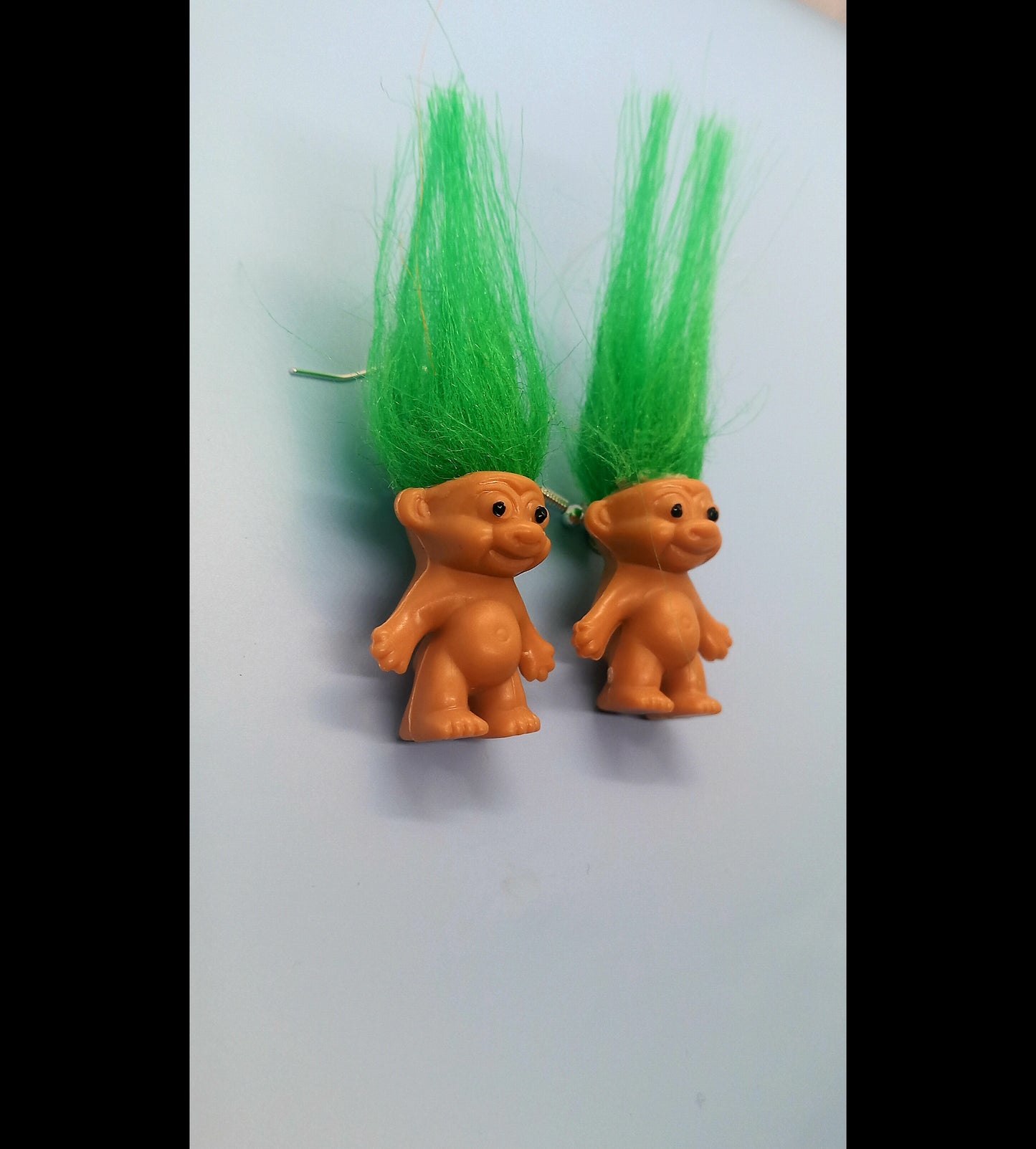 Green troll earrings